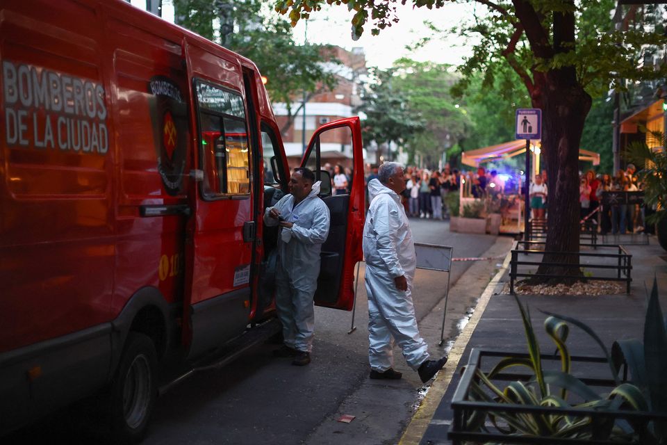 First responders arrive at the hotel where Liam Payne, former One Direction member, was found dead, in Buenos Aires, Argentina, October 16, 2024. REUTERS/Agustin Marcarian