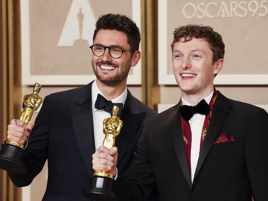Tom Berkeley and Ross White pose with the Oscar for Best Live Action Short Film for "An Irish Goodbye" Photo: Reuters/Mike Blake