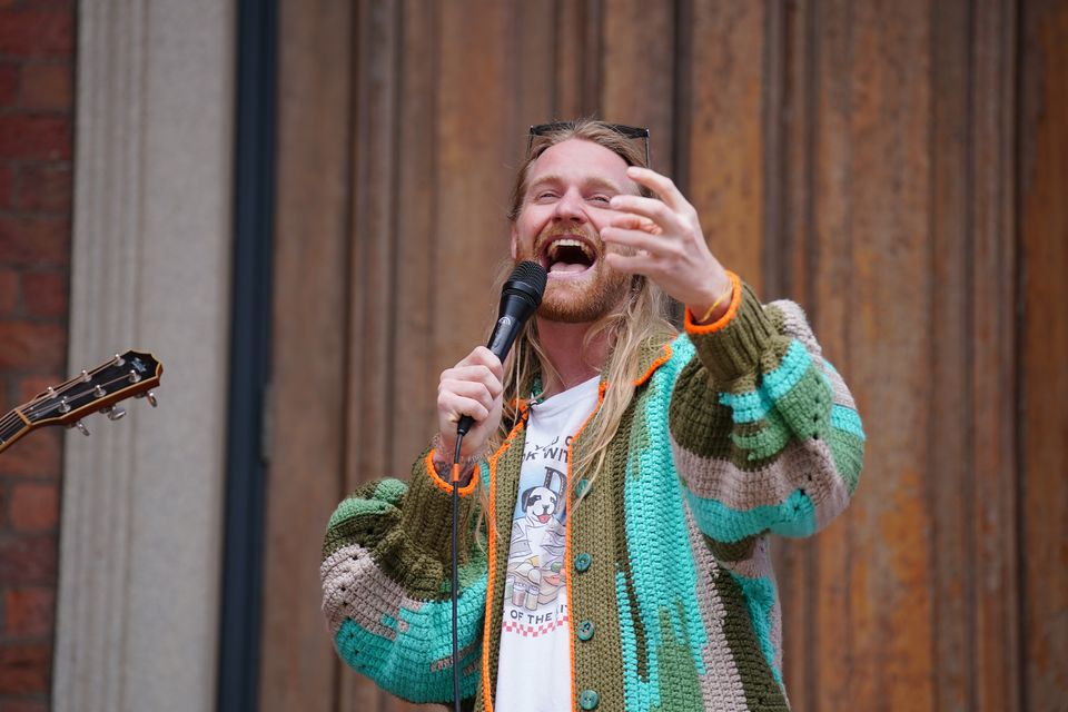 Sam Ryder performs in Liverpool town centre ahead of the semi-final of Eurovision Song Contest at the M&S Bank Arena in Liverpool (Peter Byrne/PA)