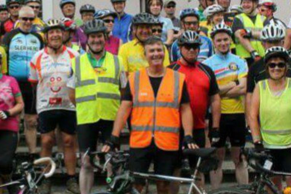 Sean Marshall (centre in orange high-visibility jacket) has been left 'sickened' by the theft of his bike five days before the Ring of Kerry Charity Cycle