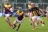 thumbnail: Wexford captain Jack Dunne getting away from Jake Mullen of Kilkenny. Photo: P.J. Howlin