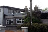 thumbnail: The aftermath of a fire at Ardscoil Éanna on the Crumlin Road in 2006. Pic: Kyran O'Brien