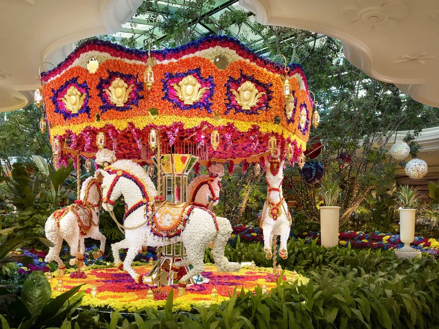 The carousel, made with real flowers, in the lobby of Boston's Encore Harbor Hotel