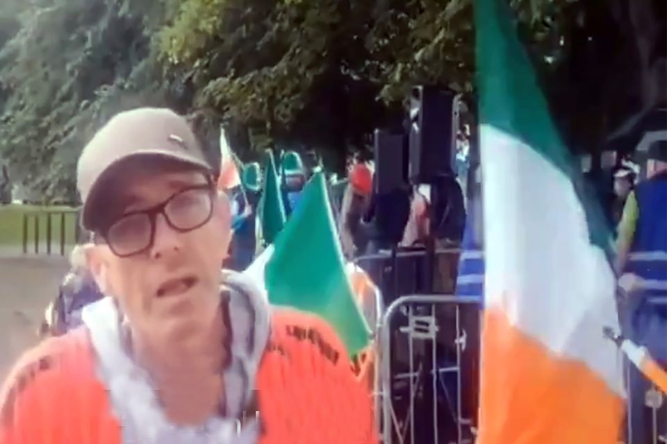 Loyalist Mark Sinclair making a live YouTube broadcast at an anti-immigrant protest in Limerick last week