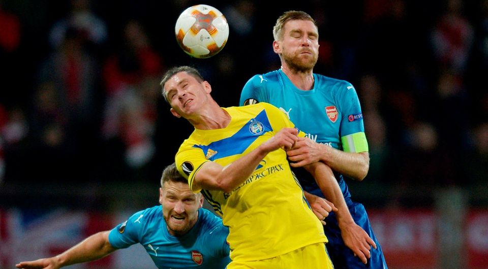 Arsenal's Per Mertesacker and Shkodran Mustafi in action with BATE Borisov’s Mikalay Signevich. Photo: Adam Holt/Action Images via Reuters