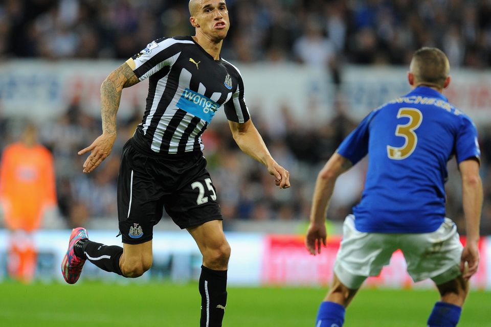 Newcastle player Gabriel Obertan (l) in action during the Barclays Premier League match between Newcastle United and Leicester City