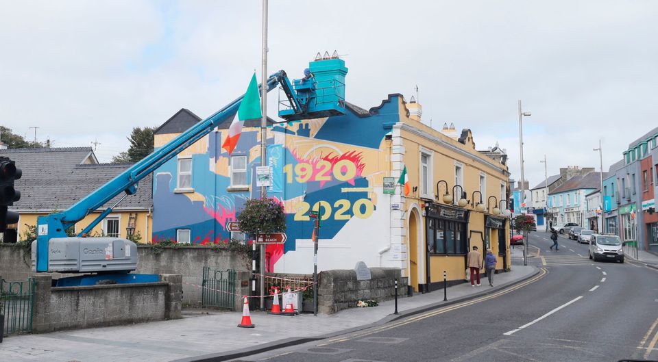 A mural is painted on Bridge Street in Balbriggan Co Dublin, to mark the centenary of the sacking of the town by British soldiers in 1920