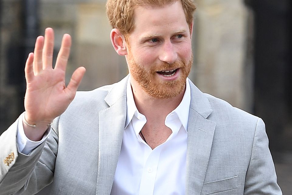 Britain's Prince Harry greets wellwishers outside Windsor Castle ahead of his wedding to Meghan Markle tomorrow, in Windsor, Britain, May 18, 2018. REUTERS/Clodagh Kilcoyne