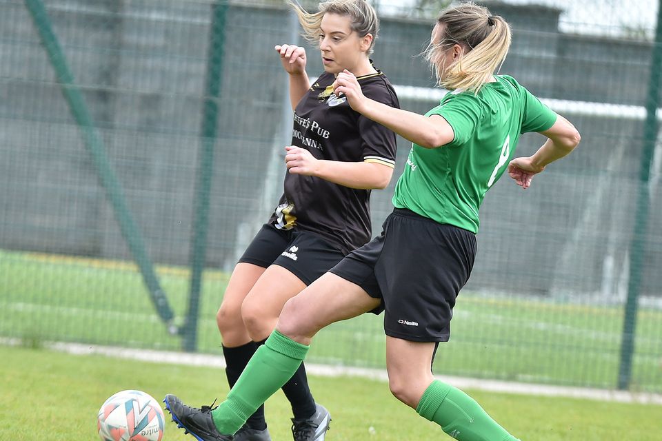 Carnew FC's Nicole Curran comes under pressure from Sinead Keogh of Wicklow Rovers during the Divisional Shield final at Gorey Rangers grounds on Sunday. 