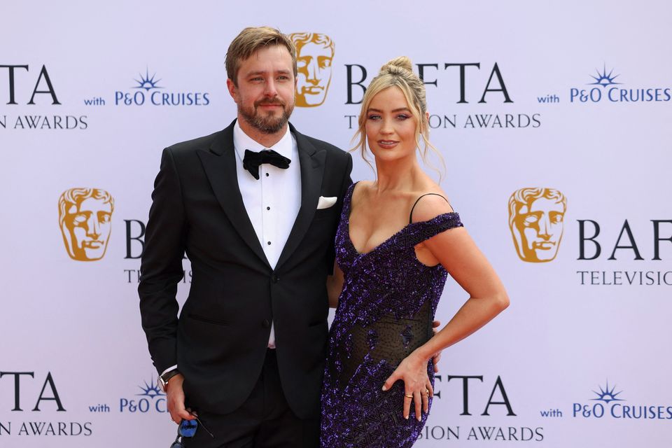 Laura Whitmore and Iain Stirling pose on the red carpet at the 2024 BAFTA Television Awards in London, Britain, May 12, 2024. REUTERS/Hollie Adams