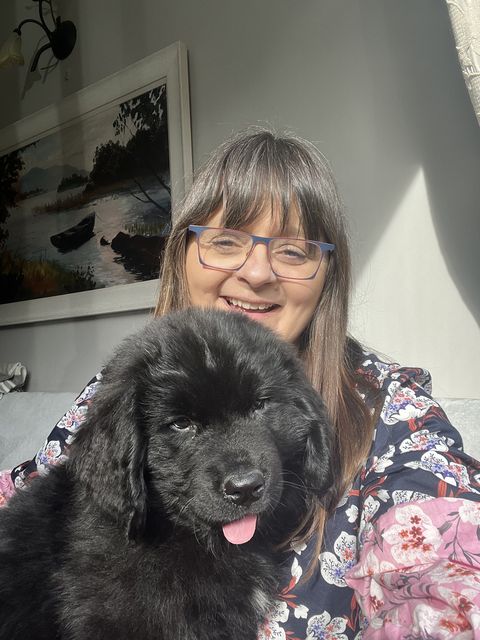 Interior designer Gwen Kenny with one of her dogs