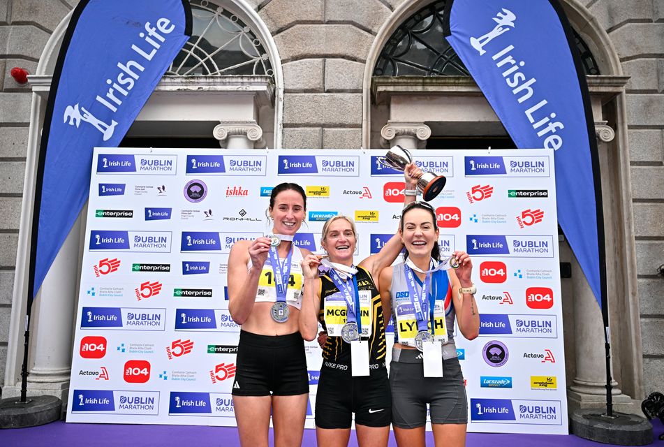 Irish Women's National championship top 3 finishers, from left, second place Aoife Kilgallon of Sligo AC, first place Ann-Marie Mc Glynn of Letterkenny AC and Grace Lynch of Dundrum South Dublin AC during the 2024 Irish Life Dublin Marathon. Photo: Sam Barnes/Sportsfile