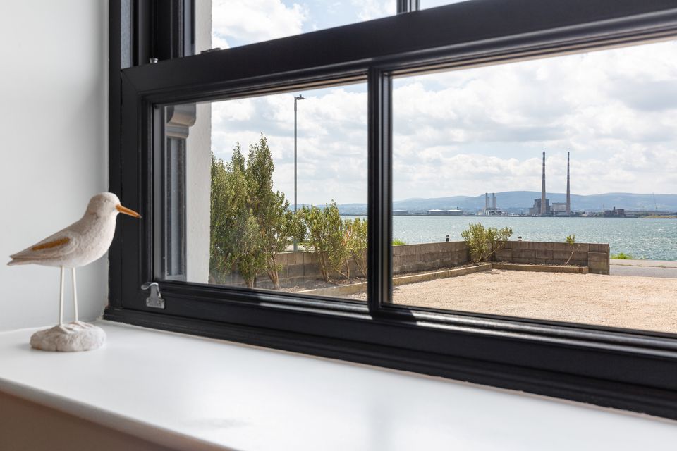 A window with views of the Poolbeg chimneys