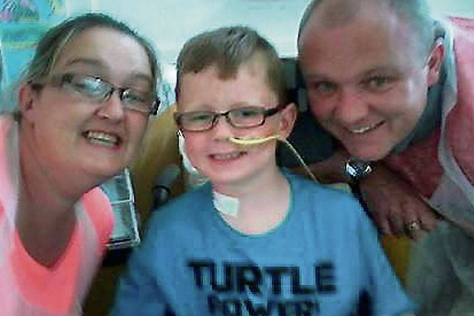 Gillian and Karl Scully with Sean, who was shot by accident