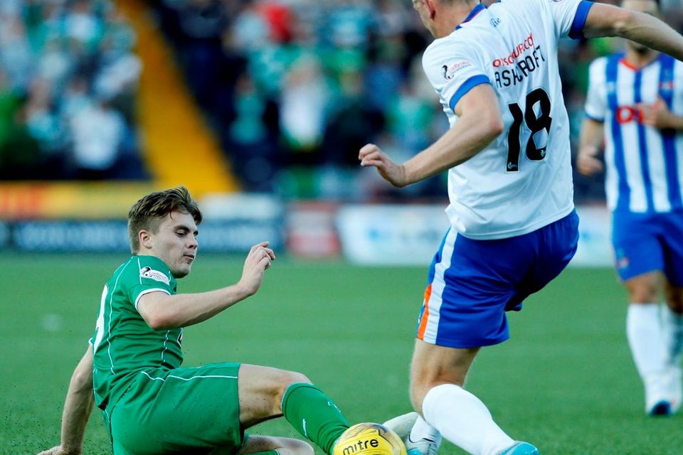 Celtic's James Forrest get's to a loose ball ahead of Lee Ashcroft