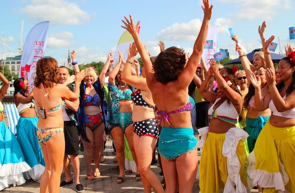 Lorraine Kelly (to the left, in a floral bikini) with her guests during the live dancing segment for the 'Bikini Promise' campaign
Pic: ITV