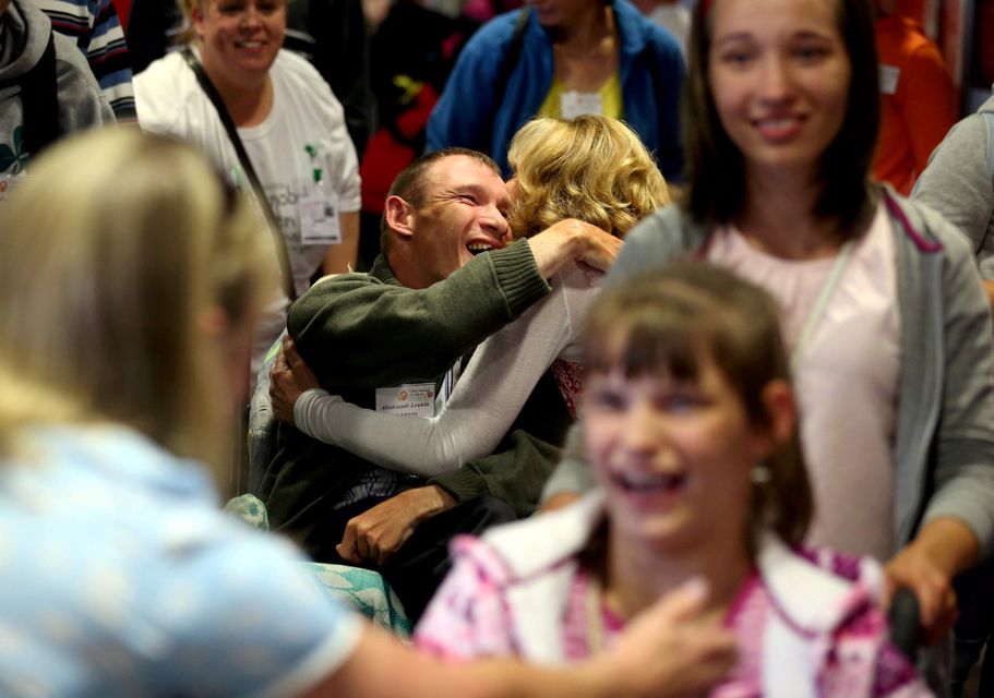 Friday, June 26, 2015: A very special group of 30 children from Belarus landed at Dublin Airport today (Friday, June 26th) as part of an urgent mercy mission by Adi Roches Chernobyl Children International (CCI) to airlift children out of the region and away from lethal forest fires for respite care in Ireland this summer. Pictured was Sasha Leukin with Adi Roche. Picture Jason Clarke Photography.