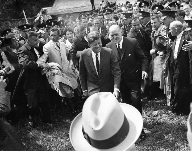 American President John Fitzgerald Kennedy (J.F.K)'s visit to Ireland, June 1963. JFK walking with a smile amongst crowd.
(Part of the Independent Ireland Newspapers/NLI Collection)