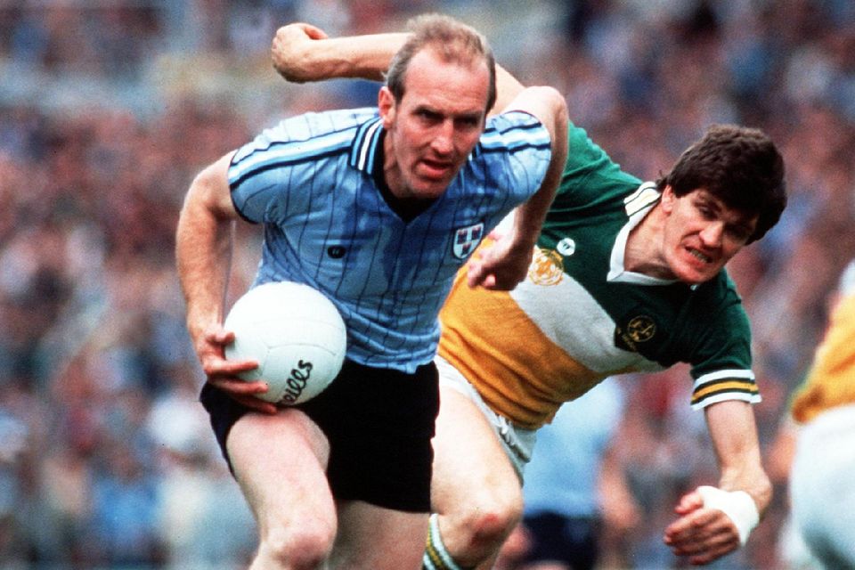 Brian Mullins against Offaly's Riche Connor in the Leinster Football final in 1983