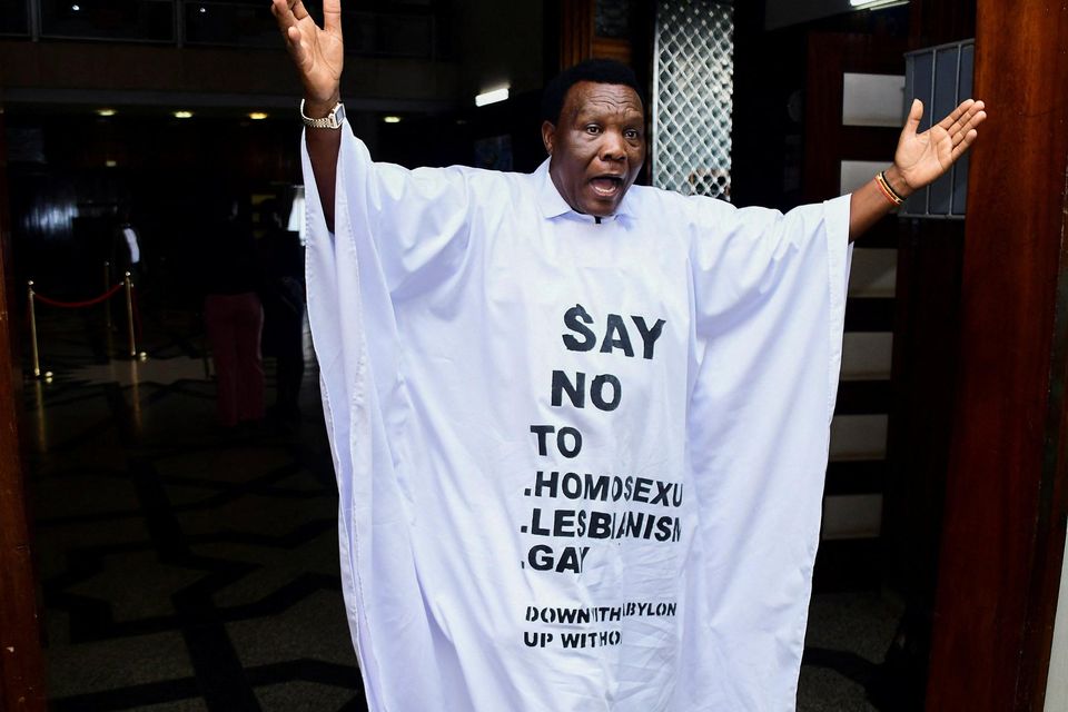 Ugandan MP John Musira wore this outfit into parliament during the bill's debate on Tuesday. Photo: Abubaker Lubowa/Reuters