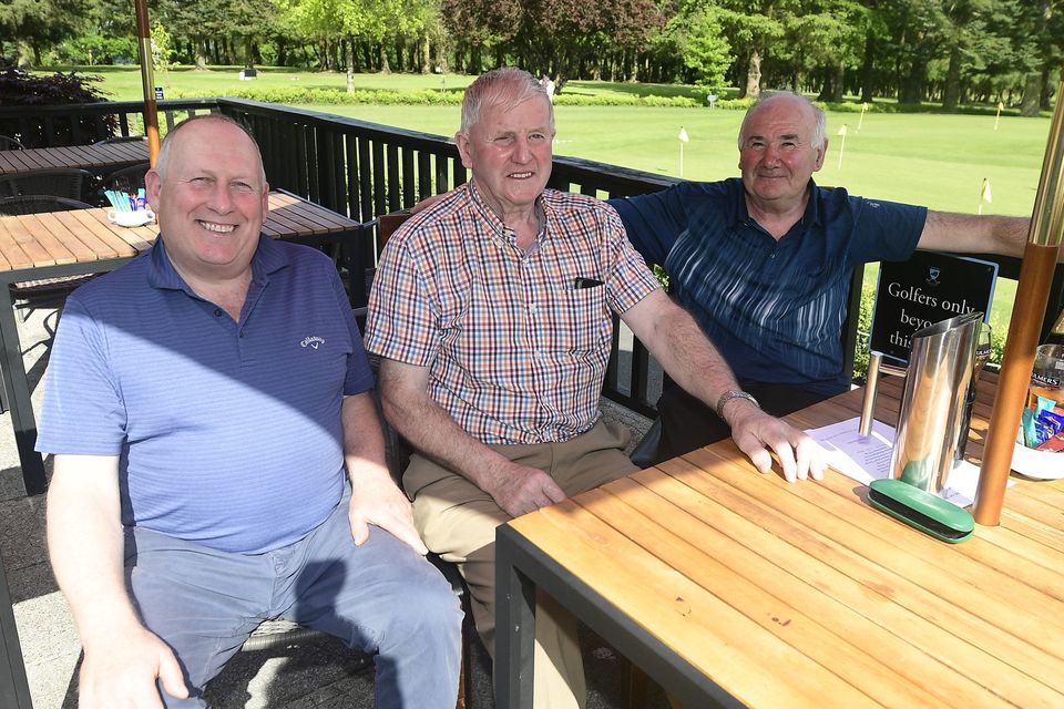 Seán Feeley, Dromtariiffe; Billy Daly, Newmarket and Billy O'Sullivan, Basllyclogh relax following their round at the Duhallow GAA Golf Classic in Kanturk. Picture John Tarrant