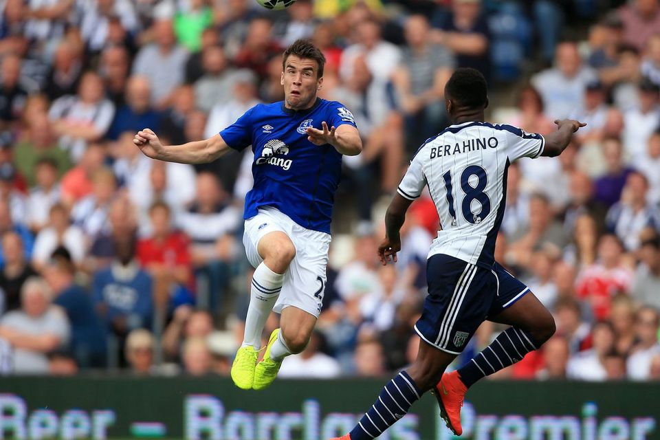 Everton's Seamus Coleman battles for the ball with West Brom's Saido Berahino
