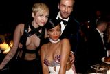 thumbnail: (L-R) Recording artists Miley Cyrus, Rihanna and honoree Tom Ford attend amfAR LA Inspiration Gala honoring Tom Ford