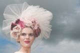 thumbnail: Danielle Gingell who is now living in Claremorris, Co. Mayo was awarded the title of Kilkenny Best Hat in a fabulous veiled floral cream creation with tulle netting by American Milliner Arturo Rios creation