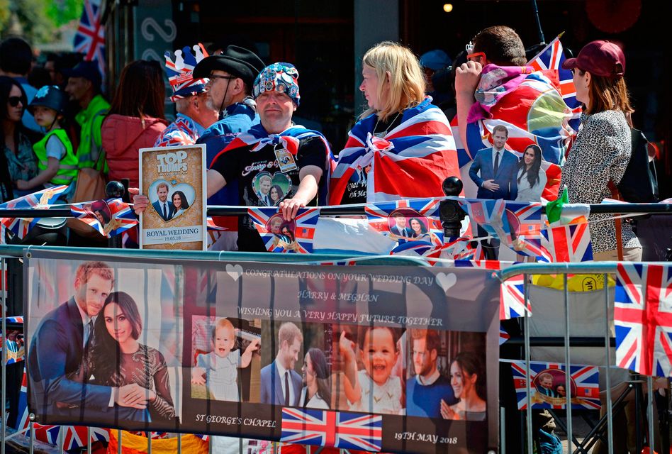 Royal fans wait to watch members of the armed forces in a parade rehearsal in Windsor, Berkshire ahead of the wedding of Prince Harry and Meghan Markle this weekend. PRESS ASSOCIATION Photo. Picture date: Thursday May 17, 2018. See PA story ROYAL Wedding. Photo credit should read: Kirsty O'Connor/PA Wire
