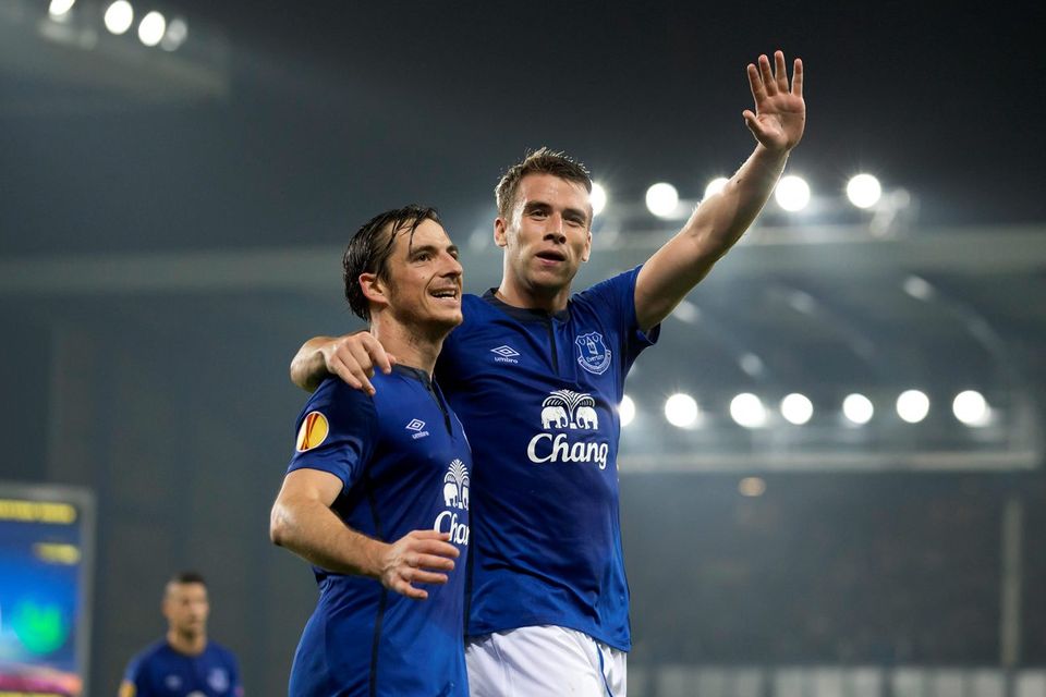 Coleman celebrates alongside teammate Leighton Baines after scoring against Wolfsburg during their Europa League Group H soccer match at Goodison Park. Photo credit: AP Photo/Jon Super