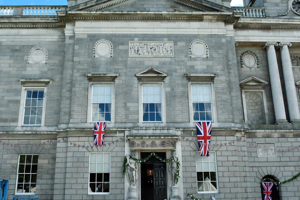 Kings Inn located on Dublin's Constitution Hill is draped in Union Jack flags and made to look like London's St Paul's Cathedral for the arrival of Queen Victoria (played by Barbara Adair) in the BBC hit TV series Ripper Street circa 1889, Dublin, Ireland - 26.08.15. Pictures: Cathal Burke / VIPIRELAND.COM *** Local Caption *** Kings Inn with Union Jacks
