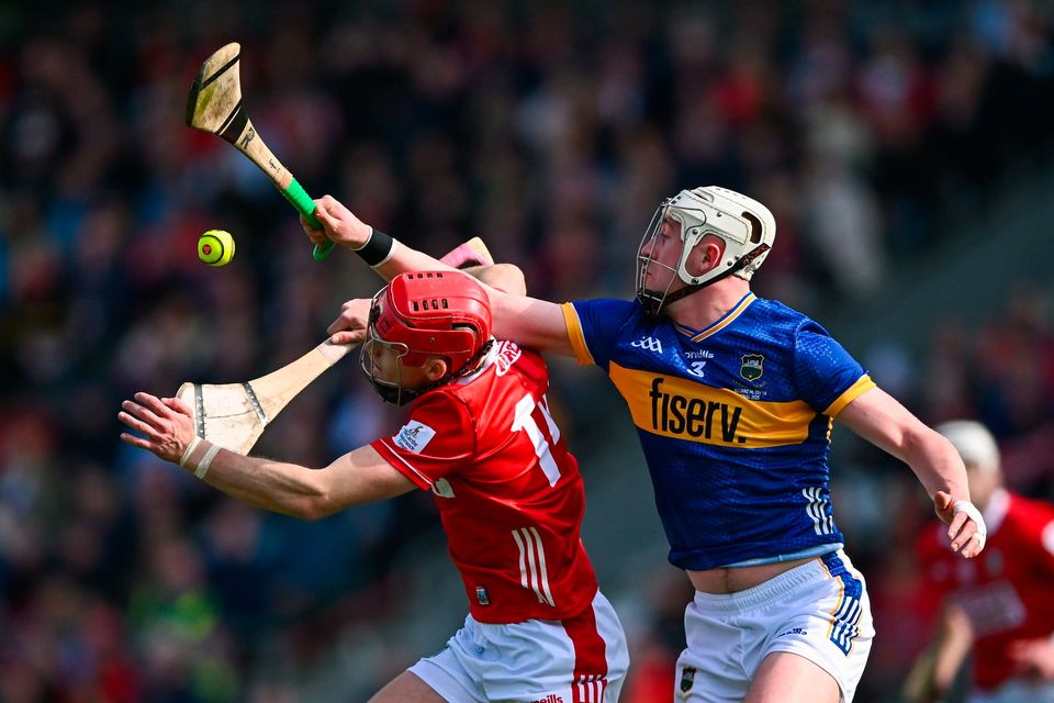 Cork's Alan Connolly in action against Tipperary's Eoghan Connolly