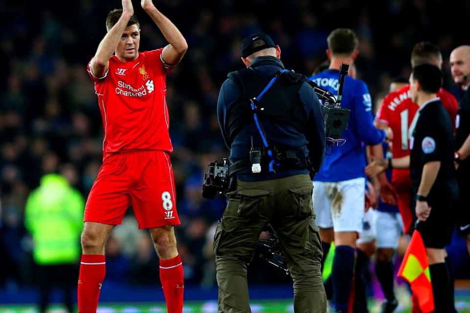 Steven Gerrard of Liverpool applauds the fans after the Barclays Premier League match between Everton and Liverpool at Goodison Park on February 7, 2015