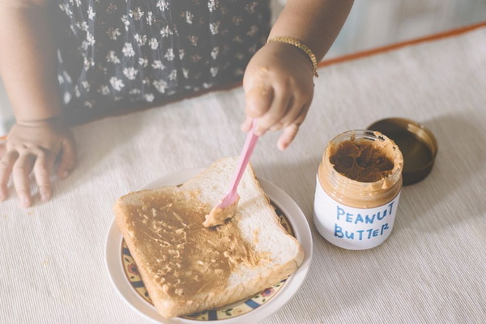 Scientists say introducing peanut butter to babies' diet helps prevent an allergy developing. Photo: Getty Images/EyeEm