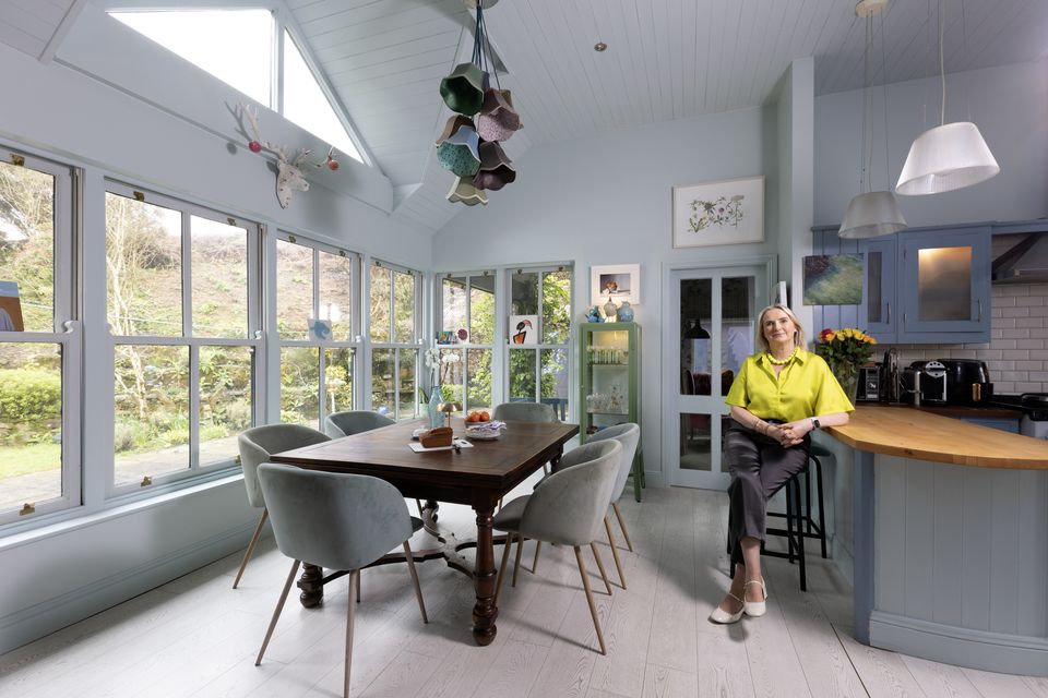 Maire Flynn of The Tannery restaurant in the dining area of her open plan kitchen/dining room — it’s full of light because of the pitched roof and the big expanses of glass. Photo: Tony Gavin