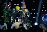 thumbnail: Madonna performs with dancers in the final show of her Celebration Tour, on Copacabana Beach in Rio de Janeiro. Photo: Silvia Izquierdo/AP