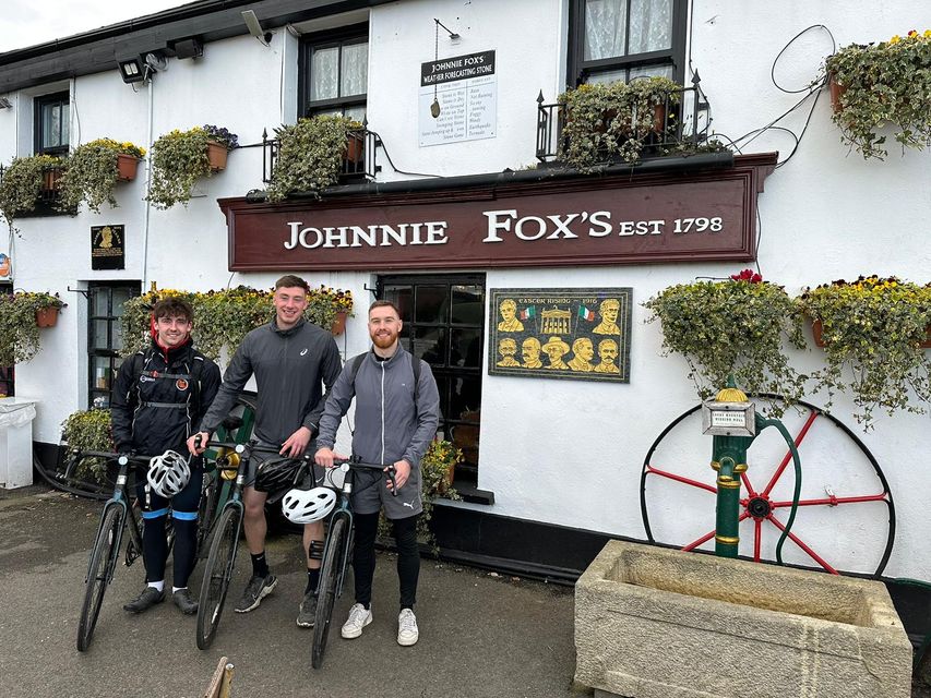 The three friends outside Johnnie Fox's pub after a training run to Glencullen in the Dublin mountains