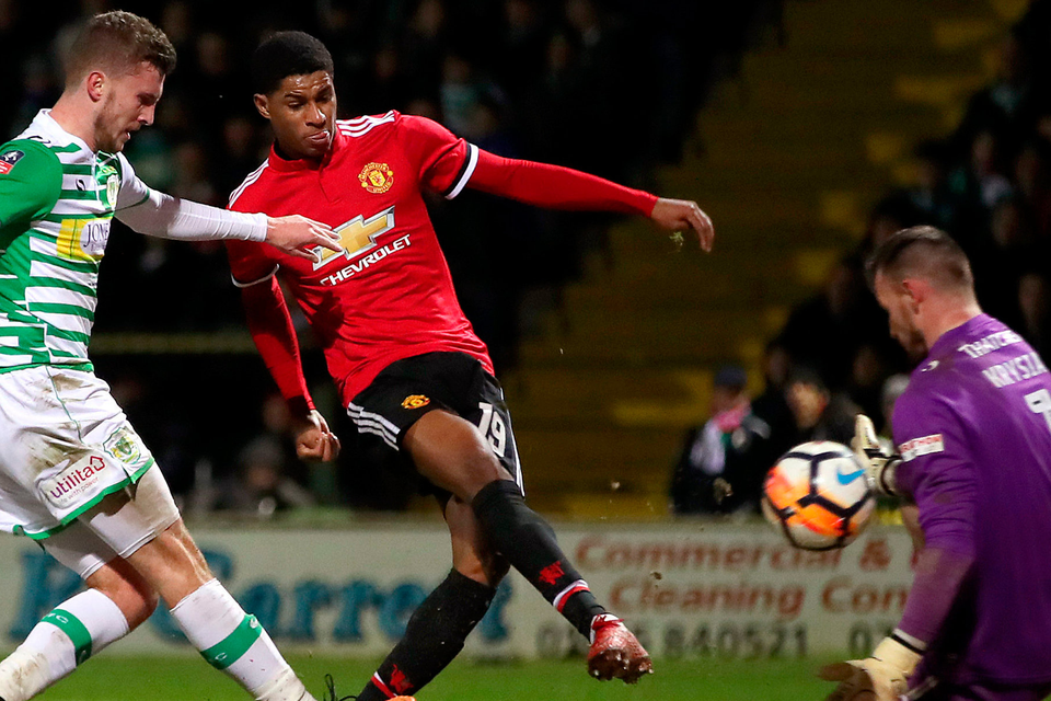 Marcus Rashford pounces on hesitation in the Yeovil defence to open the scoring for Manchester United. Photo: PA