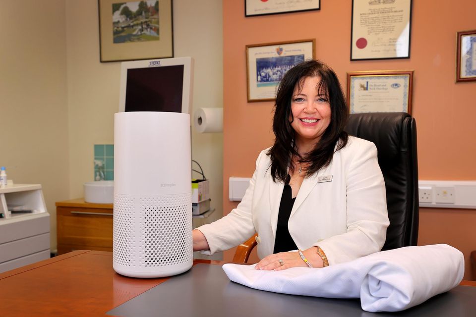 Joyce Clegg of the Allergy Clinic pictured with the Emma mattress protector (€99.99, Emma-Mattress.ie) and Dimplex Four Stage Air Purifier (€139, arnotts.ie). Photo: Frank McGrath
