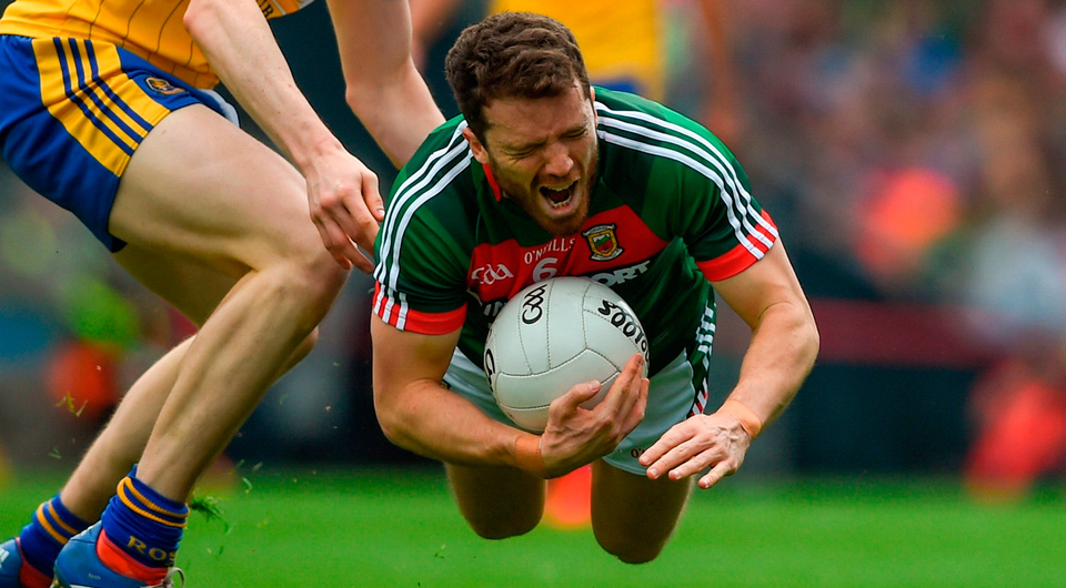 Mayo's Chris Barrett in action against Roscommon's Cathal Compton. Photo by Daire Brennan/Sportsfile