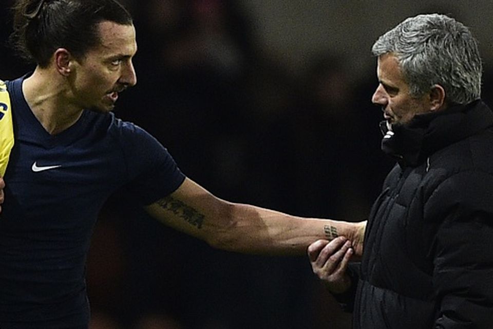 Paris Saint-Germain's Swedish midfielder Zlatan Ibrahimovic speaks with Chelsea's Portuguese manager Jose Mourinho (R) at the end of the UEFA Champions League round of 16 football match between Paris Saint-Germain (PSG) and Chelsea at the Parc des Princes stadium in Paris on February 17, 2015. AFP PHOTO / FRANCK FIFE        (Photo credit should read FRANCK FIFE/AFP/Getty Images)