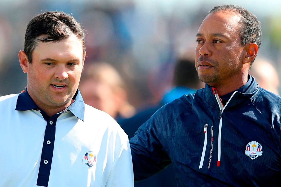 Team USA's Patrick Reed and Tiger Woods