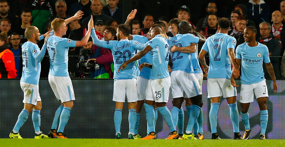 Manchester City's Kevin De Bruyne, second left, celebrates with other teammates after assisting in their fourth goal. Photo: AP