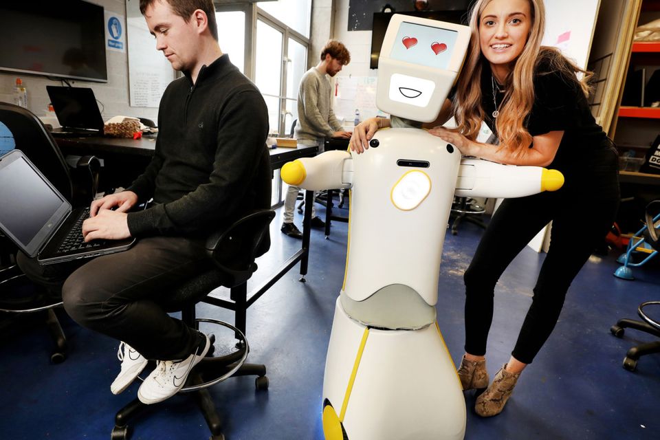 Stevie The Robot at the Robotics and Innovation Lab (RAIL) at TCD with Niamh Donnelly and Andrew Murtagh.