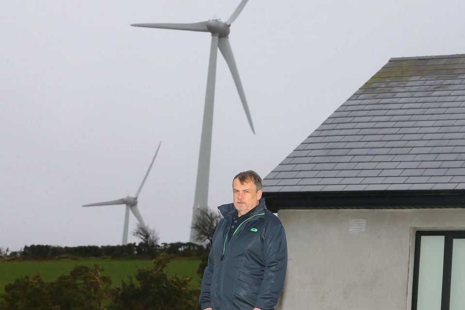Philip Hickey,  Ballindaggin, Co Wexford with wind turbines next to his house. Picture: Patrick Browne