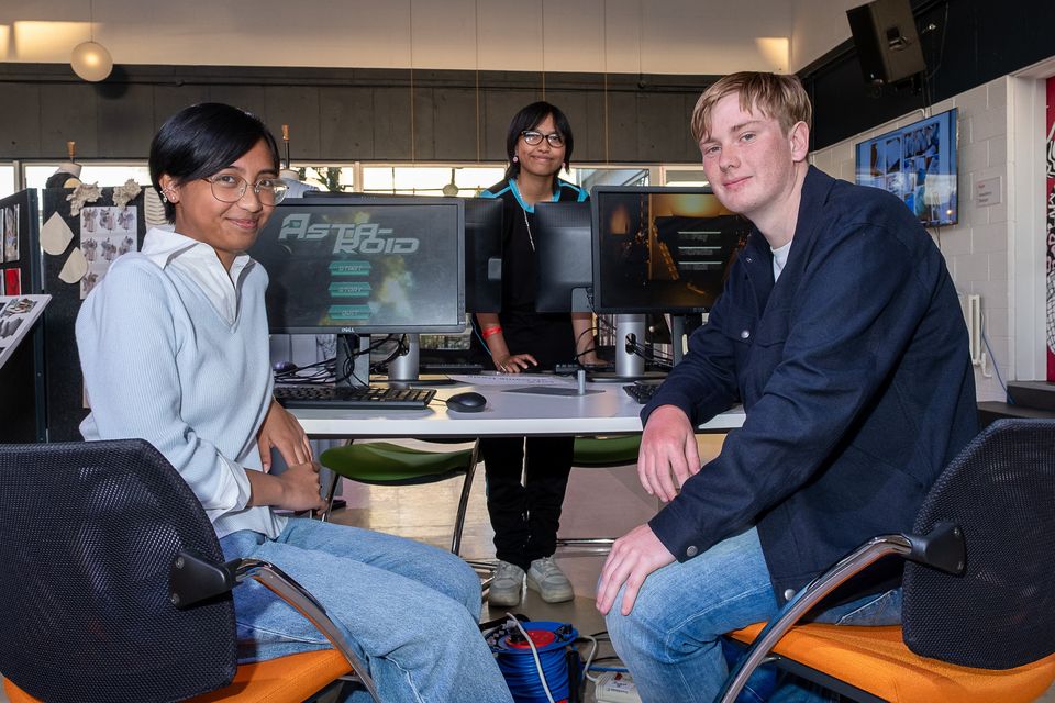Carine and Ark Lamoste with Fionn Breen at the 3D Game Design display.