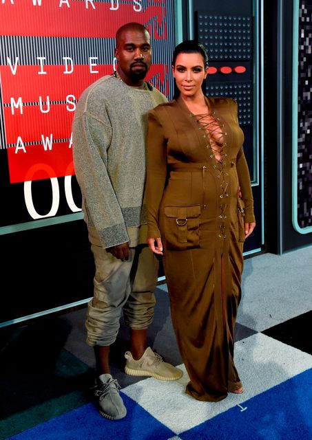 At the MTV VMAs in August, she wore am olive green gown.