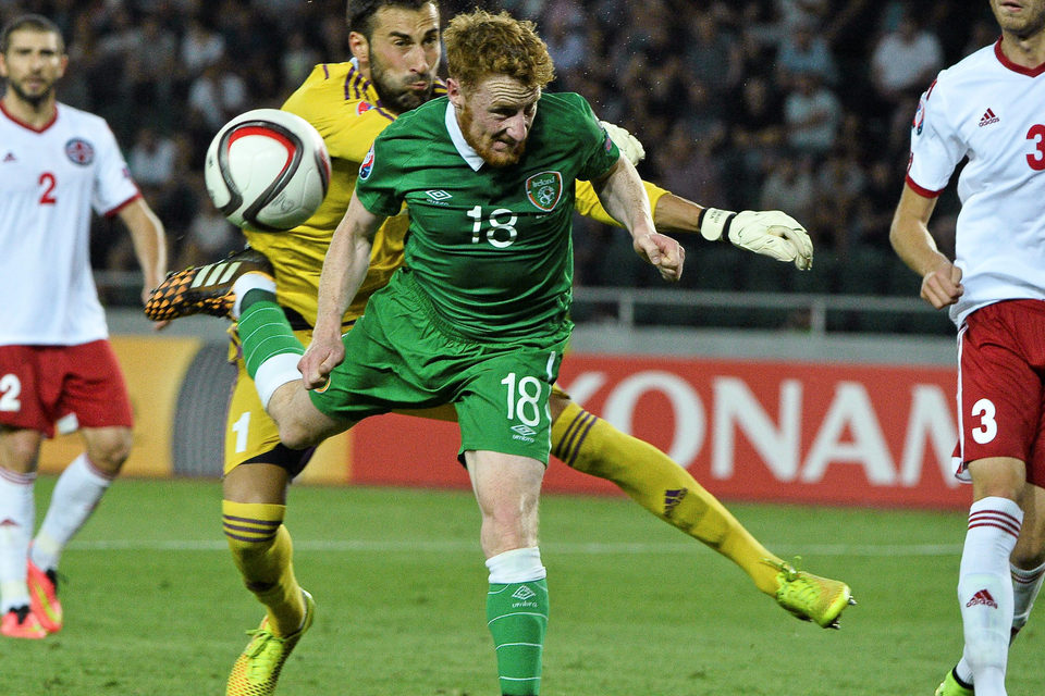 Ireland's Stephen Quinn in action against Giorgi Loria, Georgia during the Euro 2016 qualifier