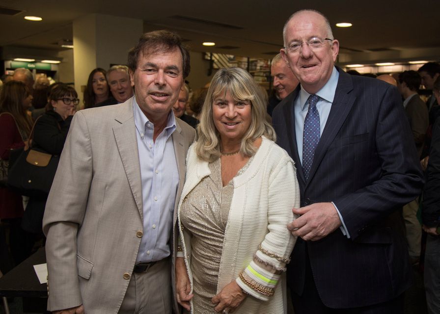 Alan Shatter with his wife Carol & Minister Charlie Flanagan at the launch of his new book, "Life Is a Funny Business" at Hodges Figgis. Picture Fergal Phillips
