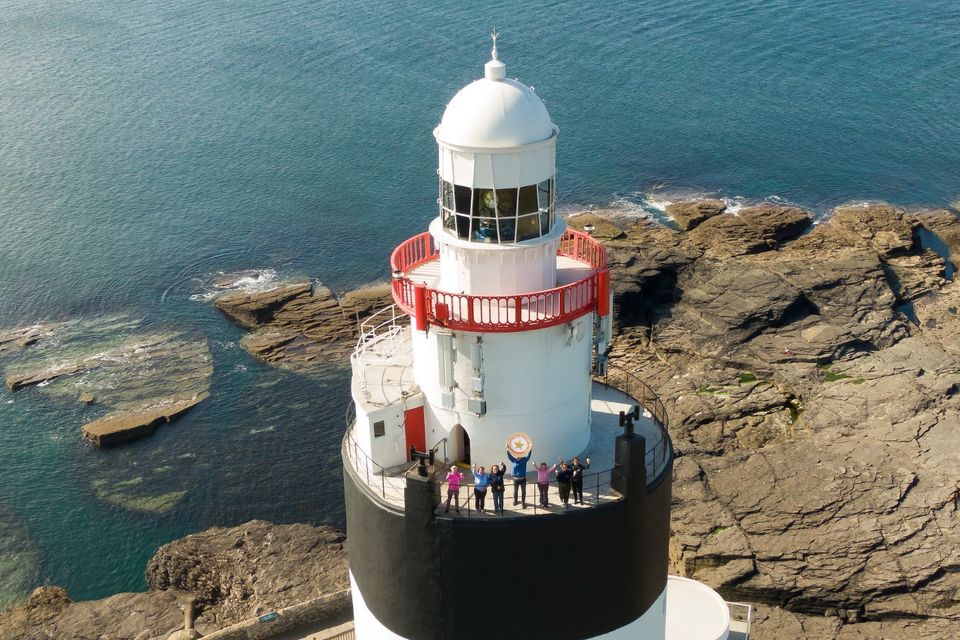 Tom, Laura and the team at the top of Hook Lighthouse. Pic Mary Browne.